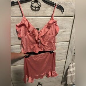 Light pink set. Small in both! Very flattering on.